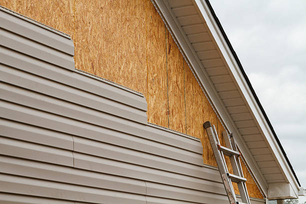 Professional Siding Installation technician working in Owensville, OH
